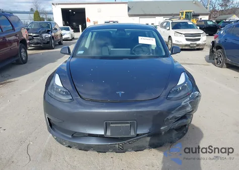 2021 Tesla Model 3 Standard Range Plus Rear-Wheel Drive z USA, uszkodzony, nr VIN 5YJ3E1EA8MF923288